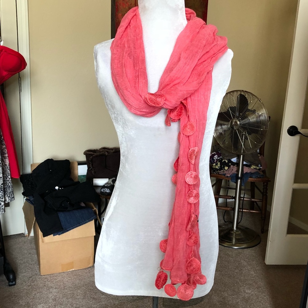Long coral scarf with embroidered disc detail